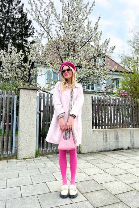 All Pink. Fashion and Style Blog Girl from Heartfelt Hunt. Girl with blonde hair wearing an all pink look with a pink coat, pink beret, slim sunglasses, floral dress, pink Staud bag, pink tights and chunky loafers. #springlook #floraldress #pinkcoat #pinkoutfit #colorfuloutfit #colorfulstyle #colorfulfashion #colorfullooks #fashionfun #cutespringoutfit #springfashion2023 #springlookbook #fitcheck #dailylooks #dailylookbook #contentcreator #microinfluencer #discoverunder20k