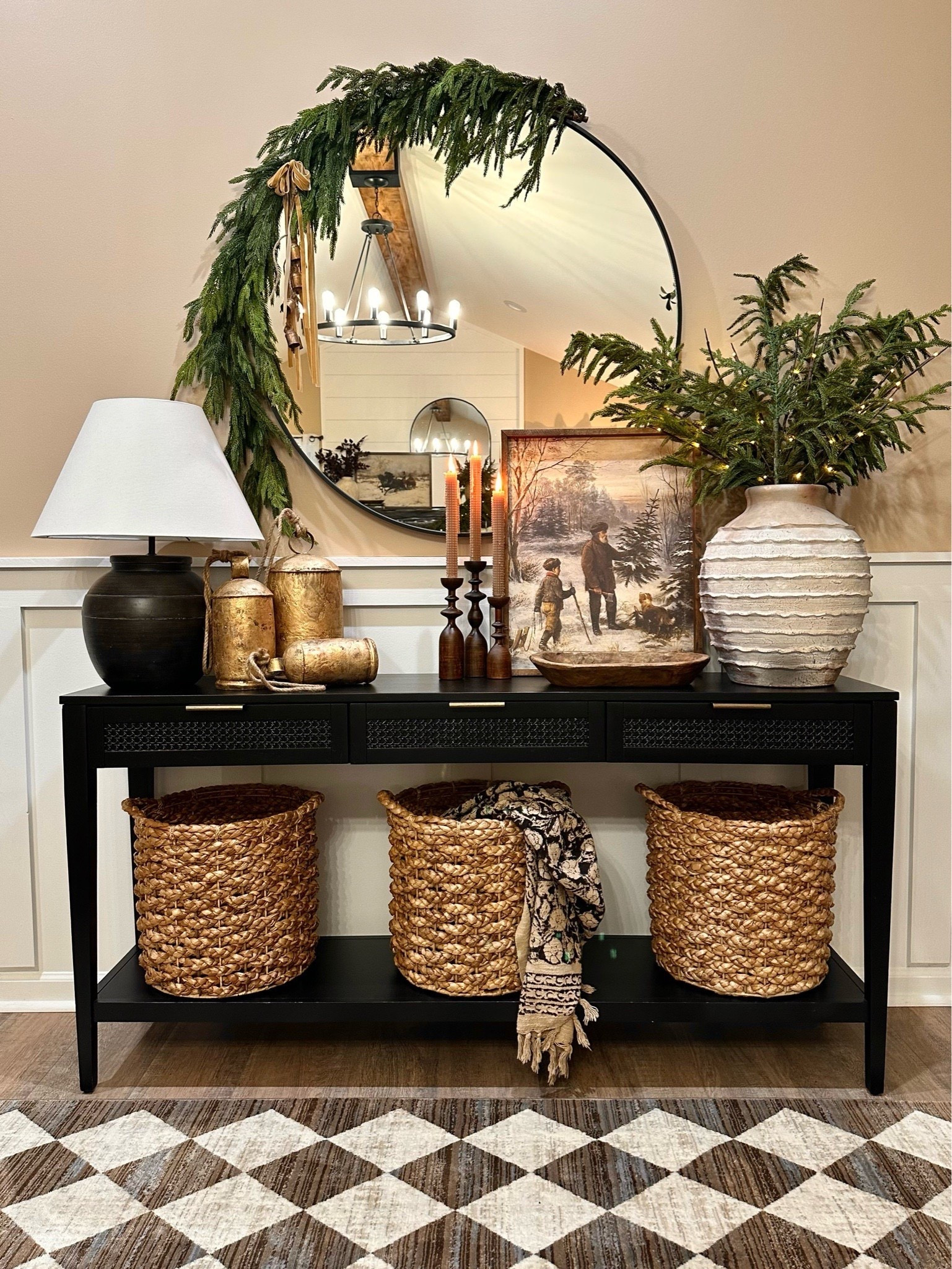 ✨🌲Neutral Christmas Console.Follow @farmtotablecreations on Instagram for more inspiration.

Here’s a nostalgic look back at last year’s console, featuring a variety of items currently on sale. From the elegant round mirror, to the Norfolk stems and garland that bring a soft touch of nature inside. The beautifully crafted wooden candlesticks that arrive packaged in an elegant gift box, making them an ideal present for any occasion. Additionally, the hand-block printed throw blanket that offers both comfort and style, down to the checkered fringed rug that ties this entire space together.

Artwork size 16x20
Four Norfolk Stems shown in vase. 

Amazon | Christmas Decor | Target Home Finds | Studio McGee | Hearth & Hand Magnolia | bathroom storage | bathroom decor | faux stems | master bath decor | home decor finds | neutral decor | cozy home | affordable decor | home decor | home inspiration | winter stems | Christmas shelves | Christmas vignette | bathroom finds | cozy home | moody decor | neutral home | Christmas console 



#LTKHoliday #LTKHome #LTKSaleAlert