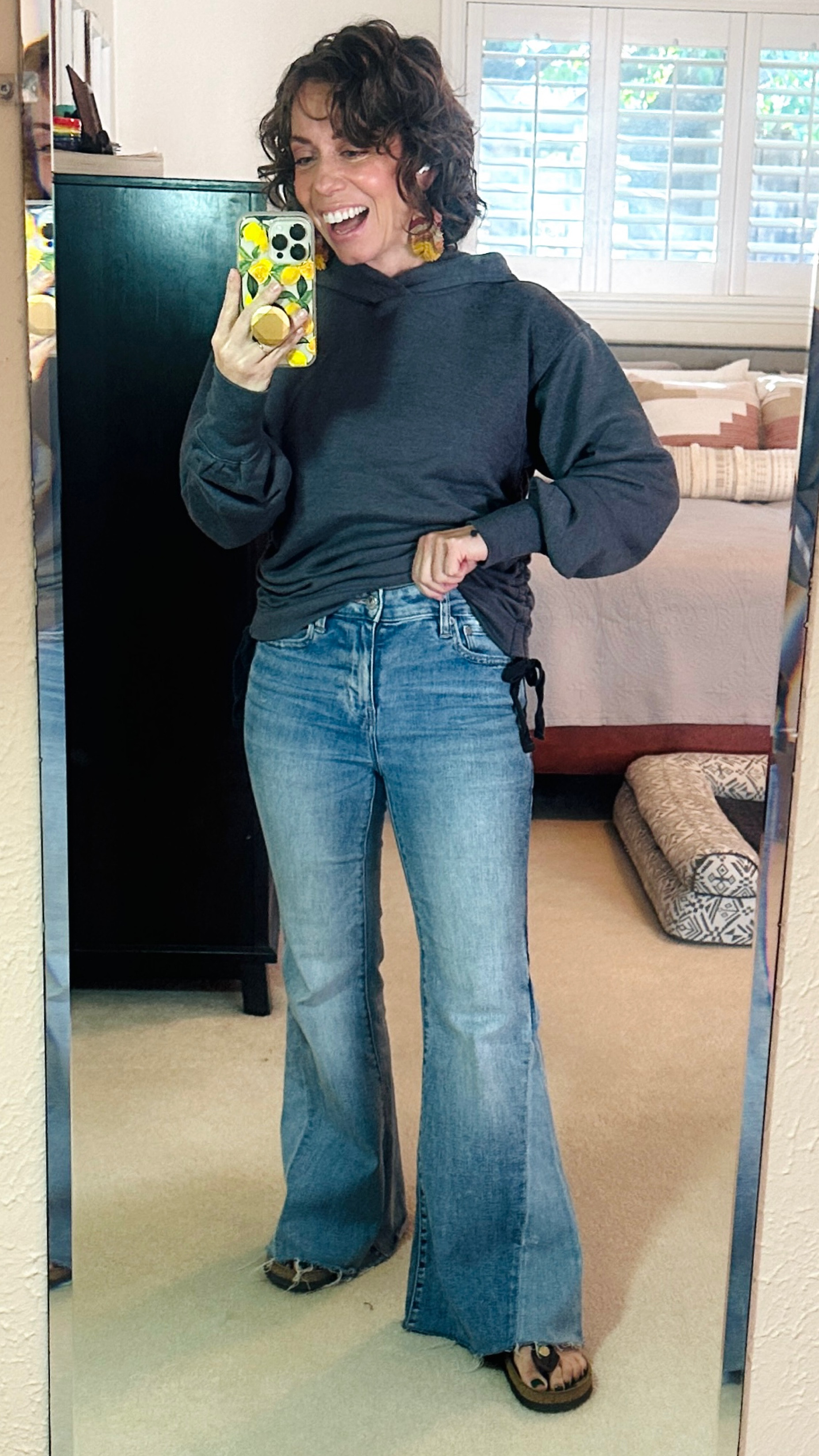 These flare jeans with raw edge hem are the stuff of my 90s childhood! Add in a high waist and I’m in heaven. The ruched hoodie is comfortable but still has shape and style. 

#LTKSeasonal #LTKbeauty #LTKunder50