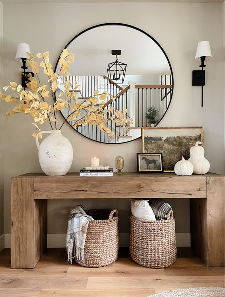 Front entryway for the fall! Love all the textures and cozy fall textiles! Beautiful warm colored stems and ceramics! 

#LTKstyletip #LTKSeasonal #LTKhome