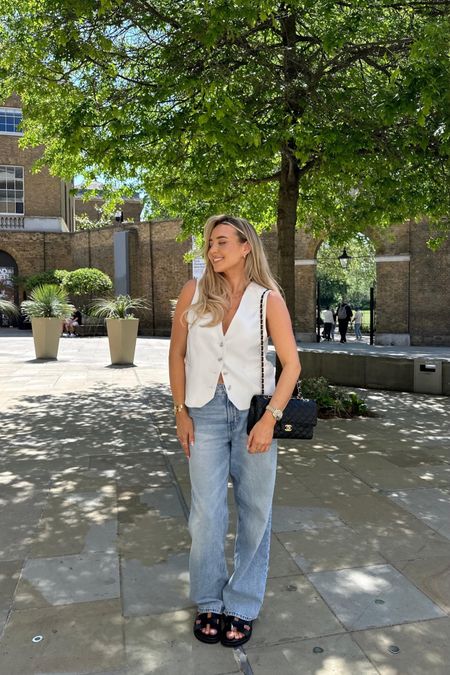 Summer Look 9 - smart casual, but swap out the white tee for a lovely easy breezy white waistcoat. Baggy blue jeans for the ultimate comfort and black accessories from Chanel and Hermes

#LTKspring #LTKsummer
