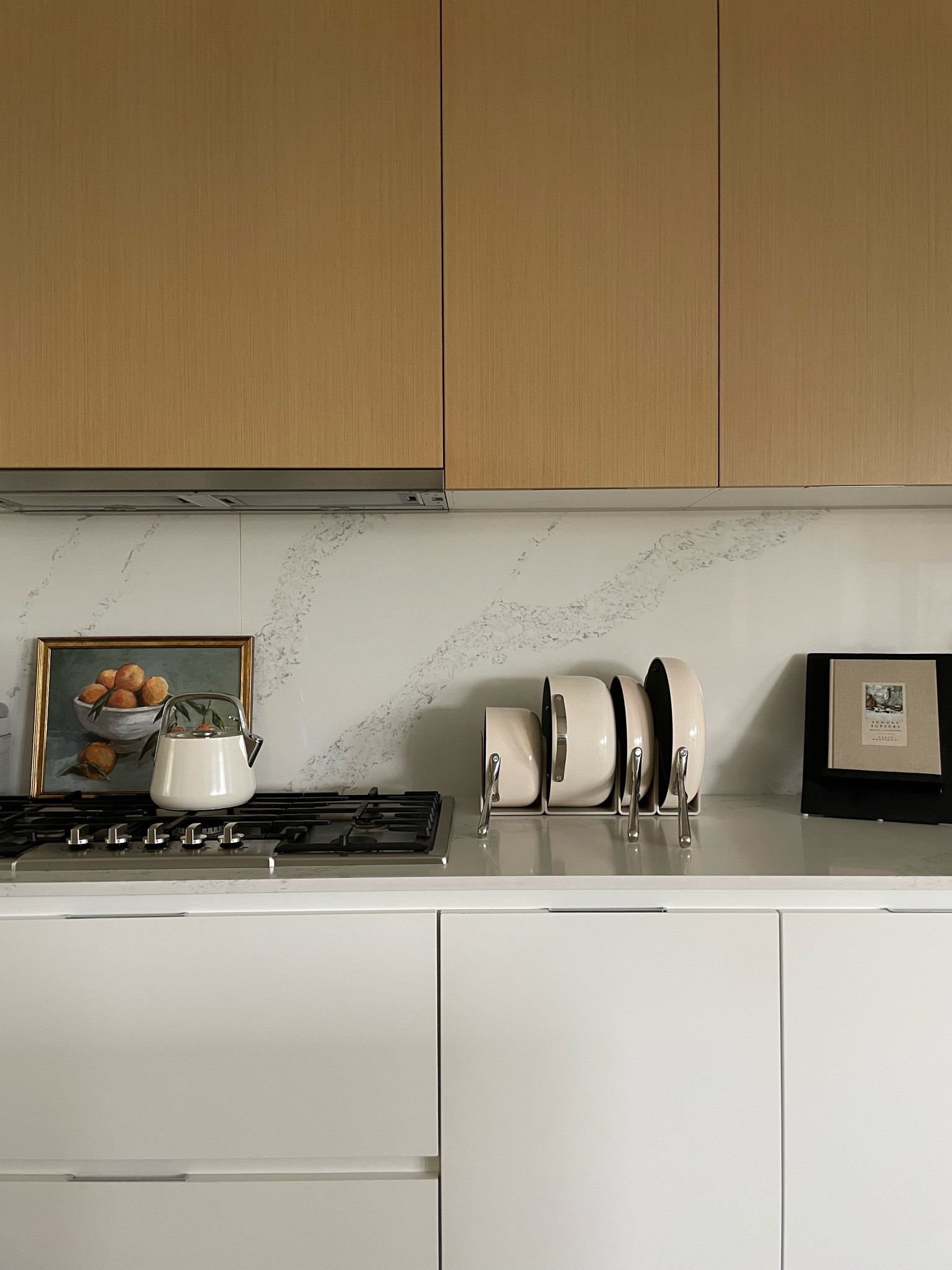 Kitchen counter decor. Kitchen pots and pans. Tea kettle. Citrus art. Cookbook holder. Book display. Target finds. Caraway pans  

#LTKFind #LTKstyletip #LTKhome