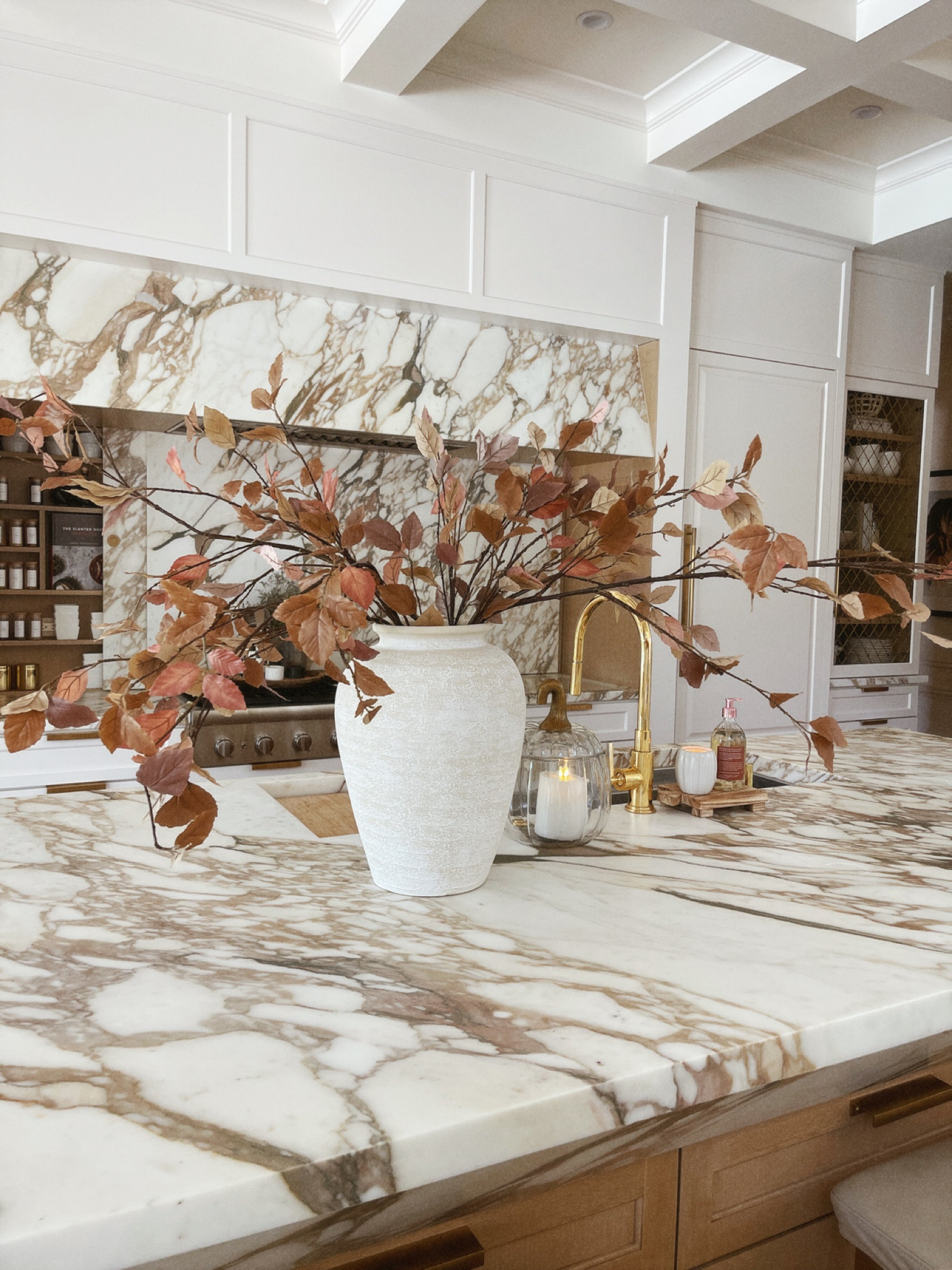 Fall branches and vase. Kitchen home decor 