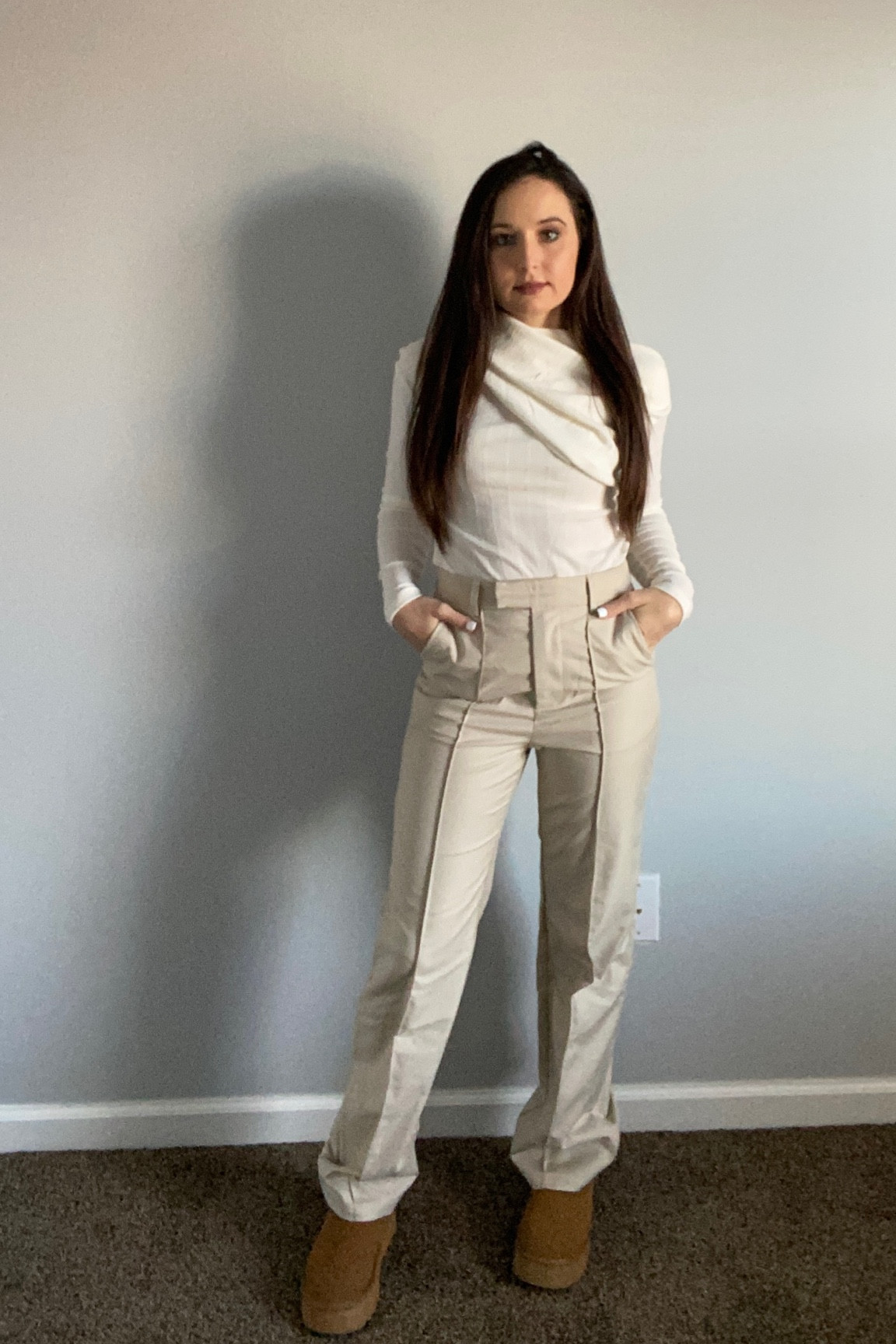 Asymmetrical top and khaki high waisted work pants 

#LTKworkwear #LTKU #LTKstyletip