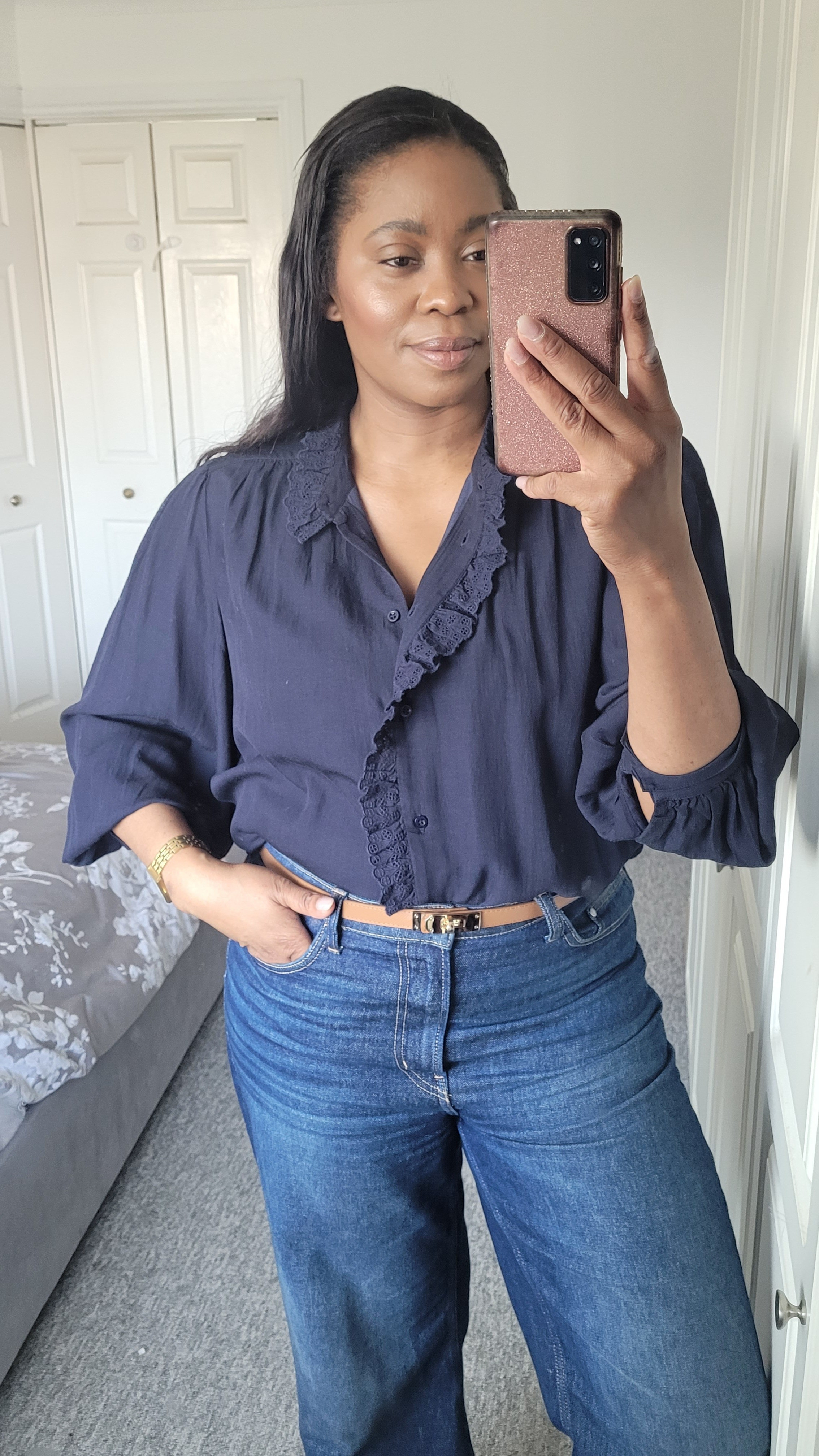 Navy ruffle top and jeans, tan belt. 70s/90s vintage Ralph Lauren inspired outfit.Casual Spring outfit, Wide jeans, tan belt. style with boots or heels for date night, wear with trainers at the wekeend.#ltkuk #ltktrends #LTKmodest #ltkover40 #widejeans 

#LTKspring #LTKstyletip #LTKdatenight
