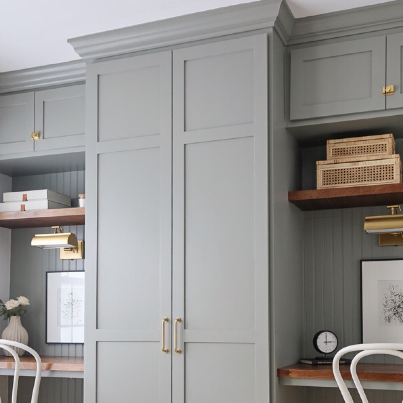 Home office makeover decor and accessories. 
Desk clock Target
Floral artwork Juniper Print Shop
Matted black frame Target
Rattan cane display boxes Amazon
Brass drawer pull Rejuvenation
Small cupboard latch brass Rejuvenation
Linen and fabric storage boxes Amazon

#LTKhome