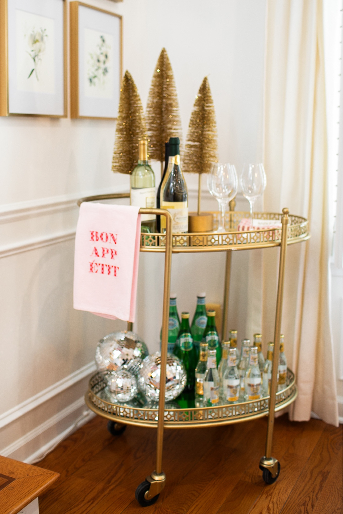 When decorating your bar cart for the 2023 holiday season, try adding some disco balls to make it fun and shimmery! 

#LTKhome #LTKHoliday #LTKSeasonal