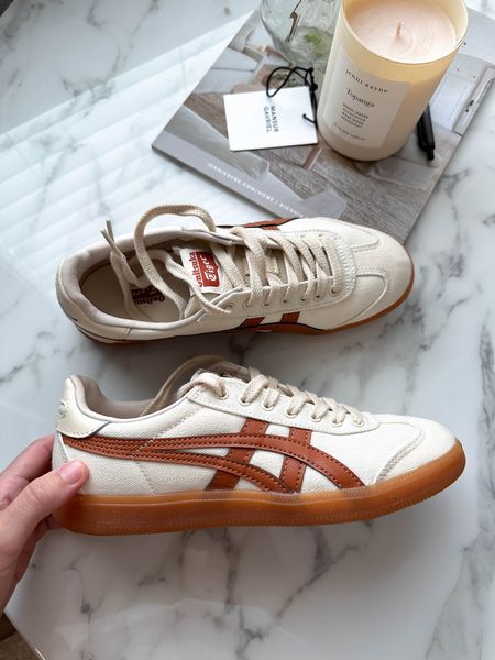 Onitsuka Tiger Tokuten sneakers in cream caramel. Runs tts. I’m wearing the men’s 4 which is equivalents to about 5.5 women’s. Comfy and love the color! 

#LTKshoecrush