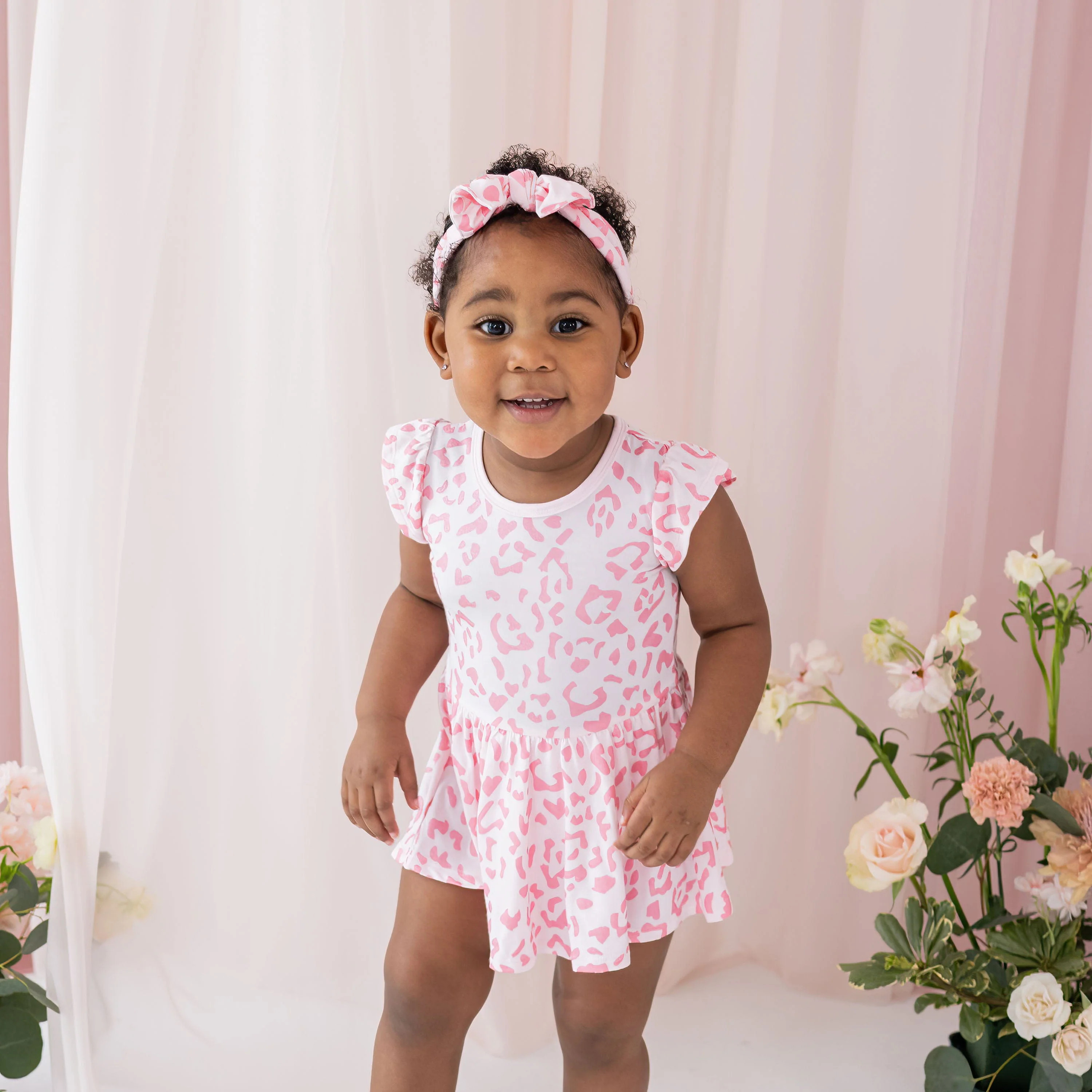Twirl Bodysuit Dress in Sakura Leopard | Kyte BABY