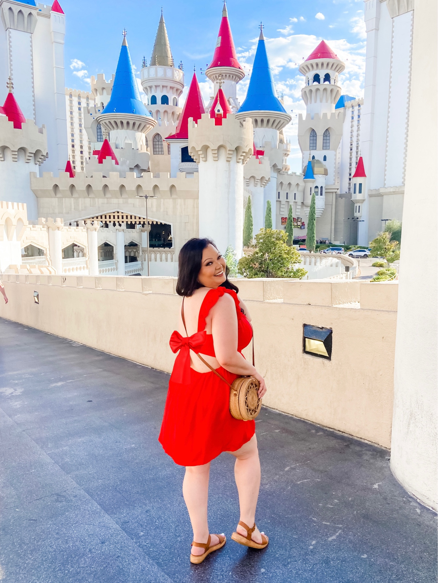 How cute is the back of this dress? Love the tie and ruffle detailing! #summerdress #reddress #ruffledress 

#LTKunder50 #LTKstyletip