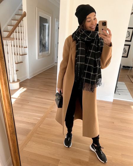 Kat Jamieson of With Love From Kat wears a winter outfit. Cashmere beanie, plaid scarf, camel coat, jogger set, sneakers, Lily & Bean bag, neutral style.  *Exact Rag & Bone scarf is sold out, similar listed below! 

#LTKSeasonal #LTKstyletip #LTKunder100