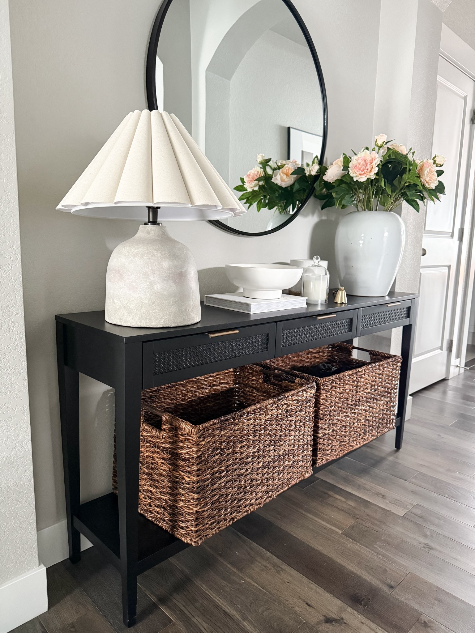 Our entryway table is back to normal! Love these big baskets for storage, and the faux peonies are so realistic! 

#LTKFindsUnder50 #LTKFindsUnder100

#LTKHome