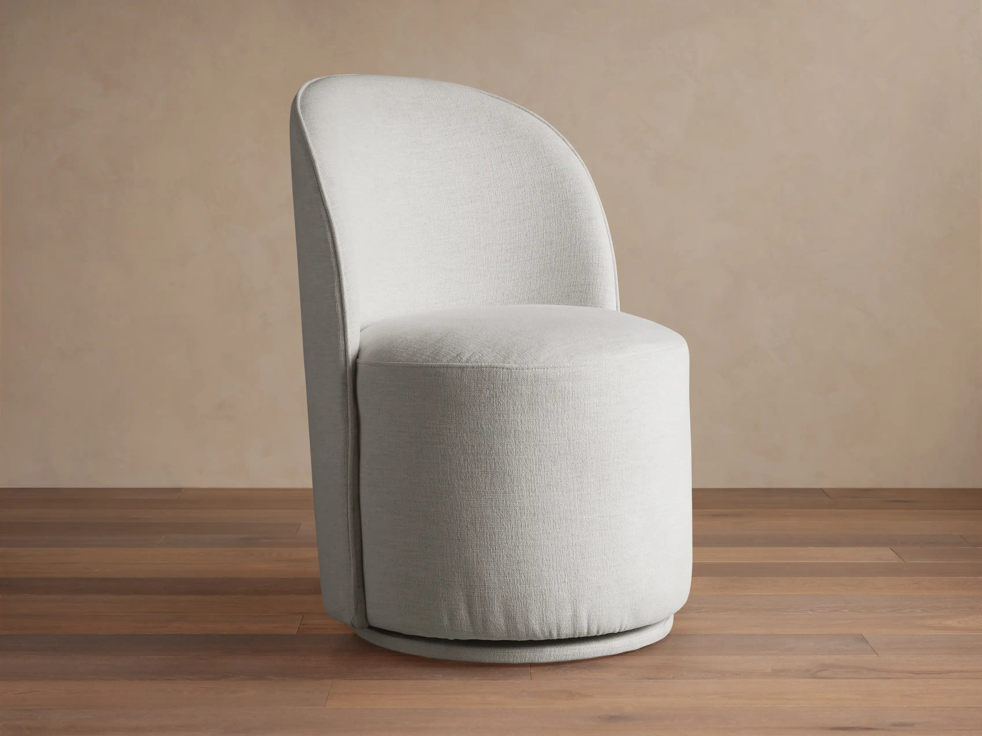 Kira Swivel Dining Chair in Nomad Snow | Arhaus