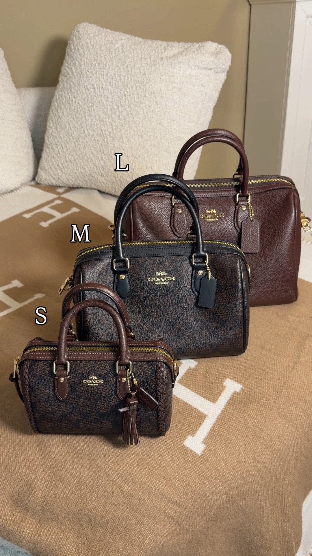 All of the Coach Outlet Rowan sizes side by side 👜 Comment SHOP & I’ll dm you the links ♥️

Large Rowan’s satchel in maple
Medium in brown jacquard signature canvas 
Mini in brown jacquard