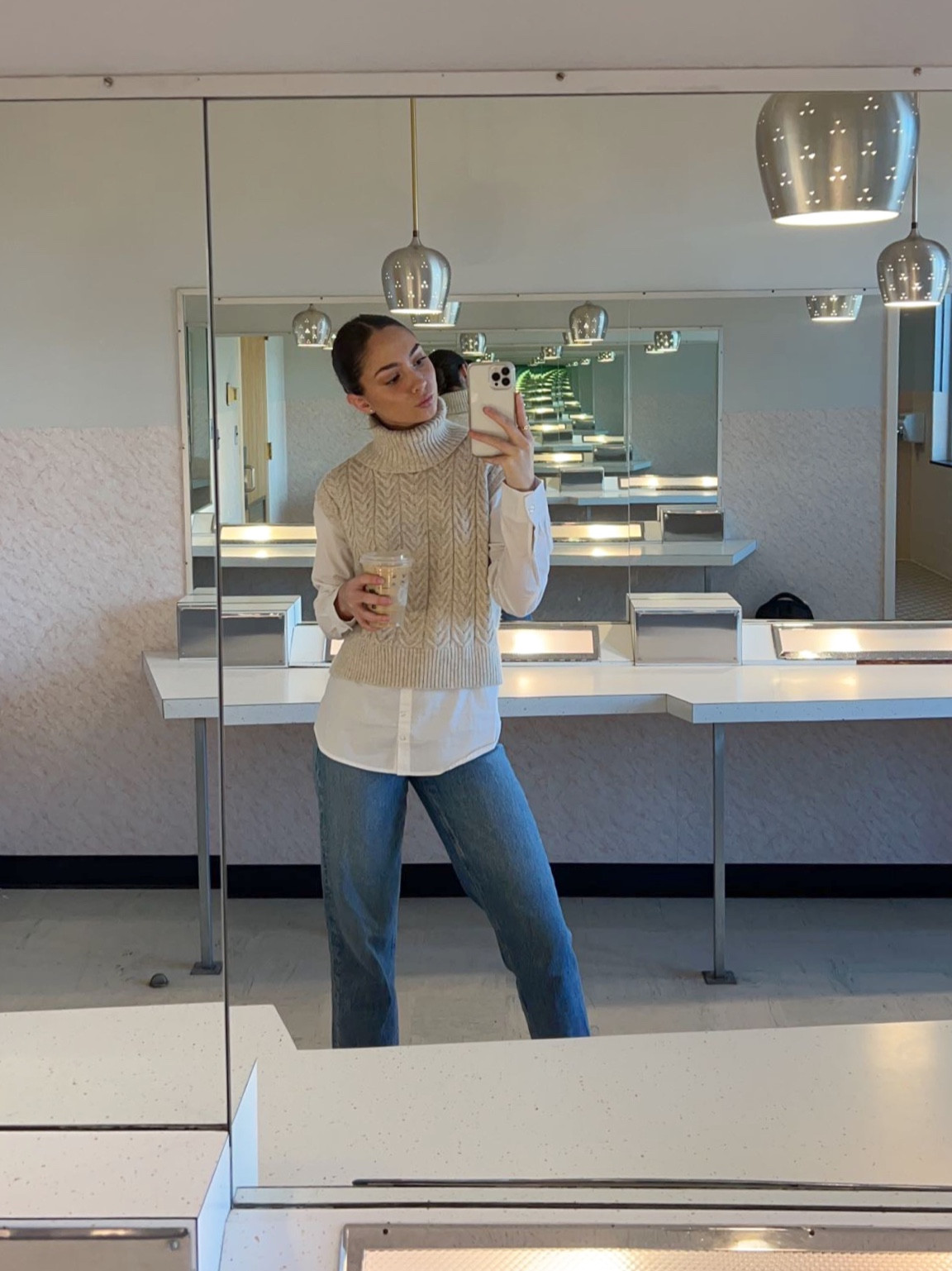 Business Casual or casual business?
Jeans, white button up and sweater vest never fails

#LTKworkwear