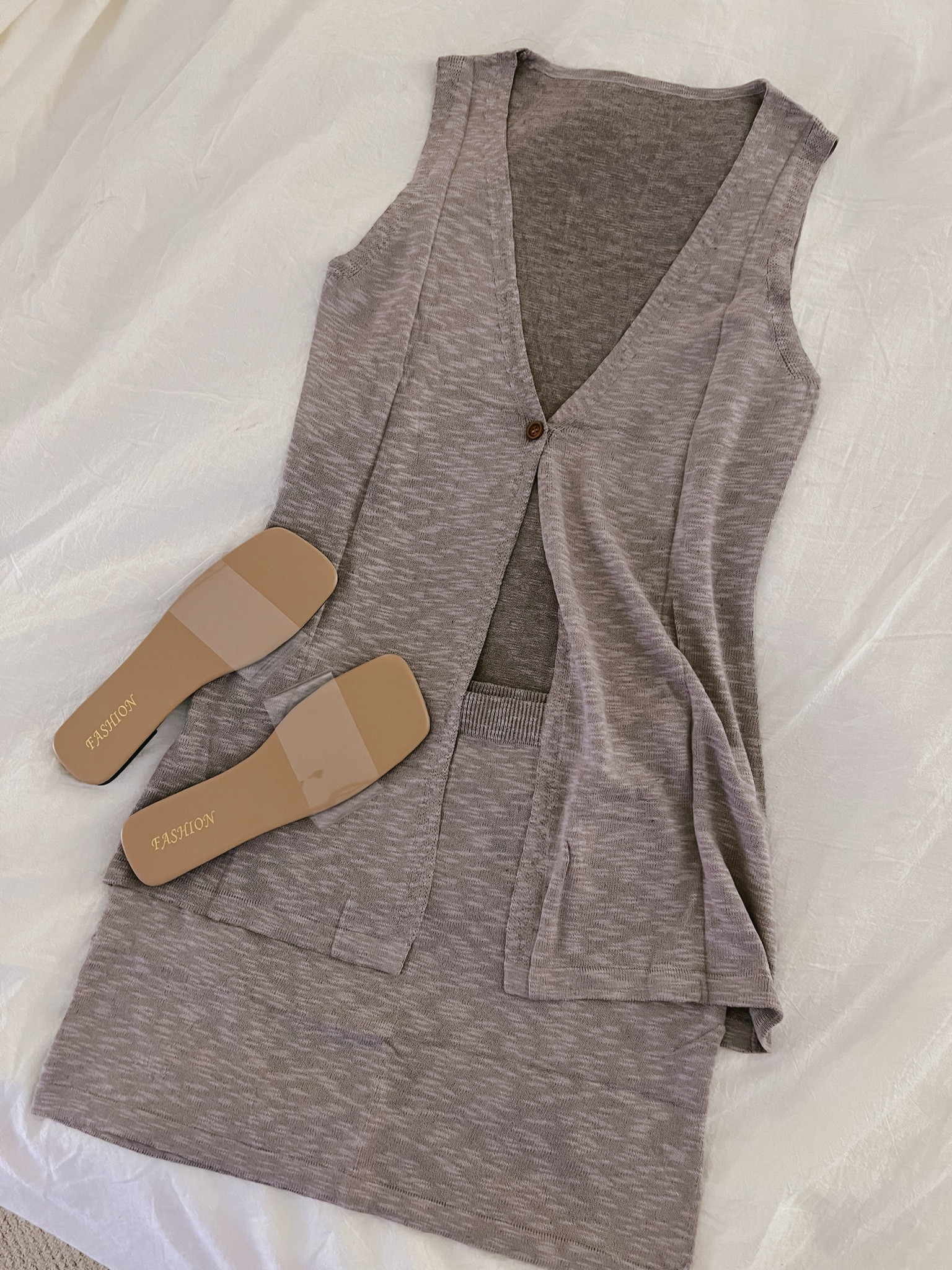 Women’s fashion. Warm weather vacay outfit ideas. 2 piece vacation sets sleeveless v neck long vest knit top and mini skirt summer beach outfits. Clear sandals transparent flat dressy slip on slides flip flops.
#womensstyle #amazonfashion #ltkshoecrush

#LTKStyleTip #LTKFindsUnder50 #LTKSeasonal