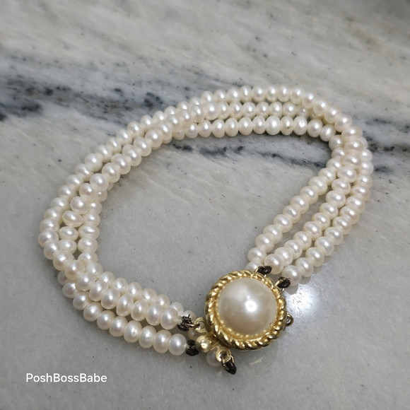 Three lines of cream cultured pearls and gold plated clasp adorned with a pearl | Poshmark