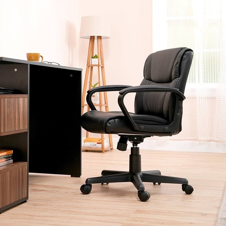 Amazon Basics Chair with Armrests and 360-Degree Swivel              
 Faux Leather  

 Office | Amazon (US)