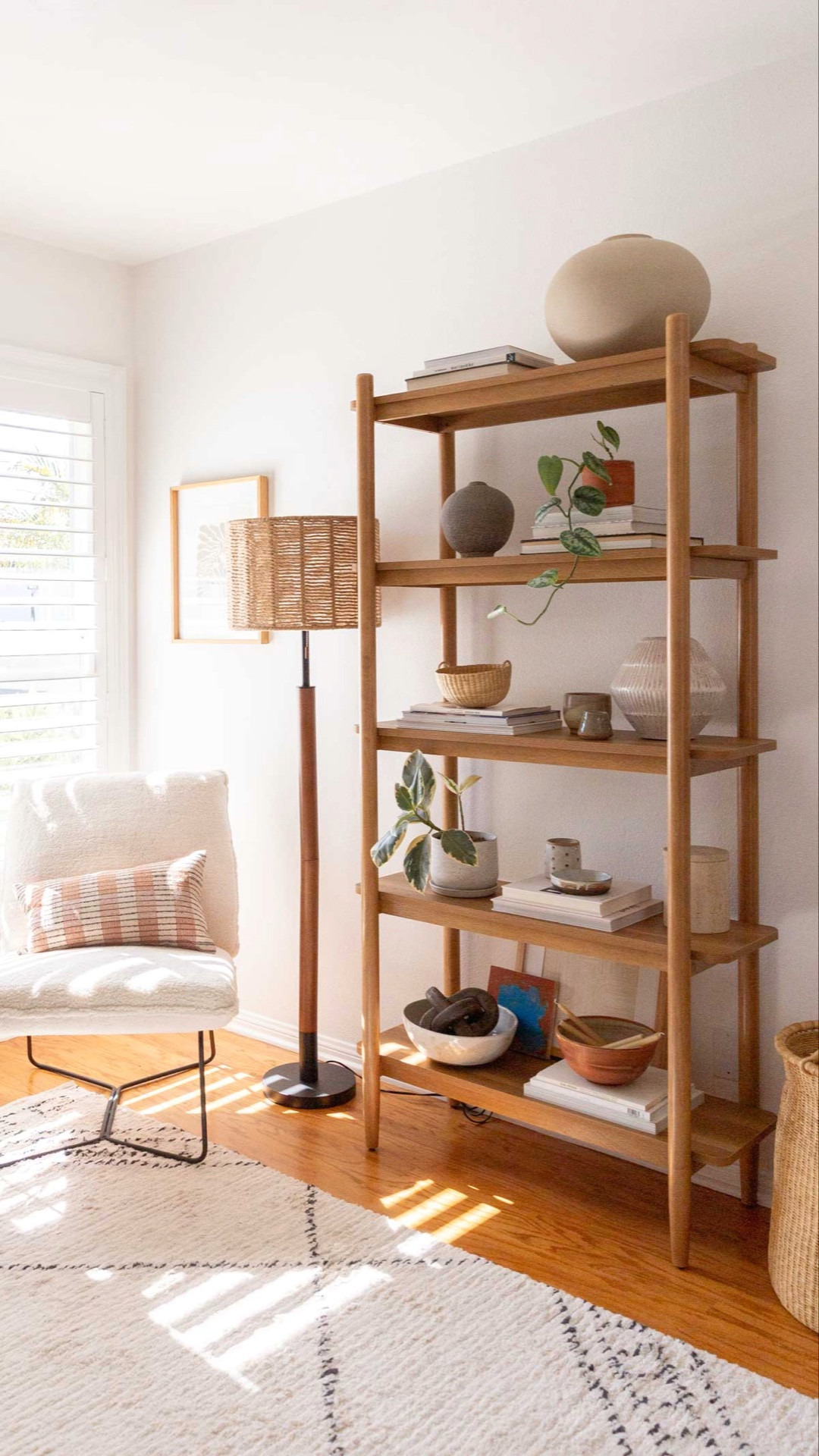 Room makeover! I turned an unused office into a place to cozy up with a book and read. Linked all the furniture - it’s all very budget-friendly. Organic modern - reading nook - bookshelf styling - seating area - jute lamp - pillow chair - affordable rug

#LTKstyletip #LTKhome #LTKFind