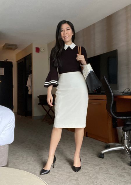 I wore a classic black and white outfit to my conference. The base of my top is one of my favorite sheer sleeveless collars which was layered under a 3/4 sleeve bell sleeve sweater. To keep my look professional, I chose a tweed high waisted knee length pencil skirt and I finished my outfit with black pumps and my MCM tote. 

#LTKstyletip #LTKworkwear #LTKFind