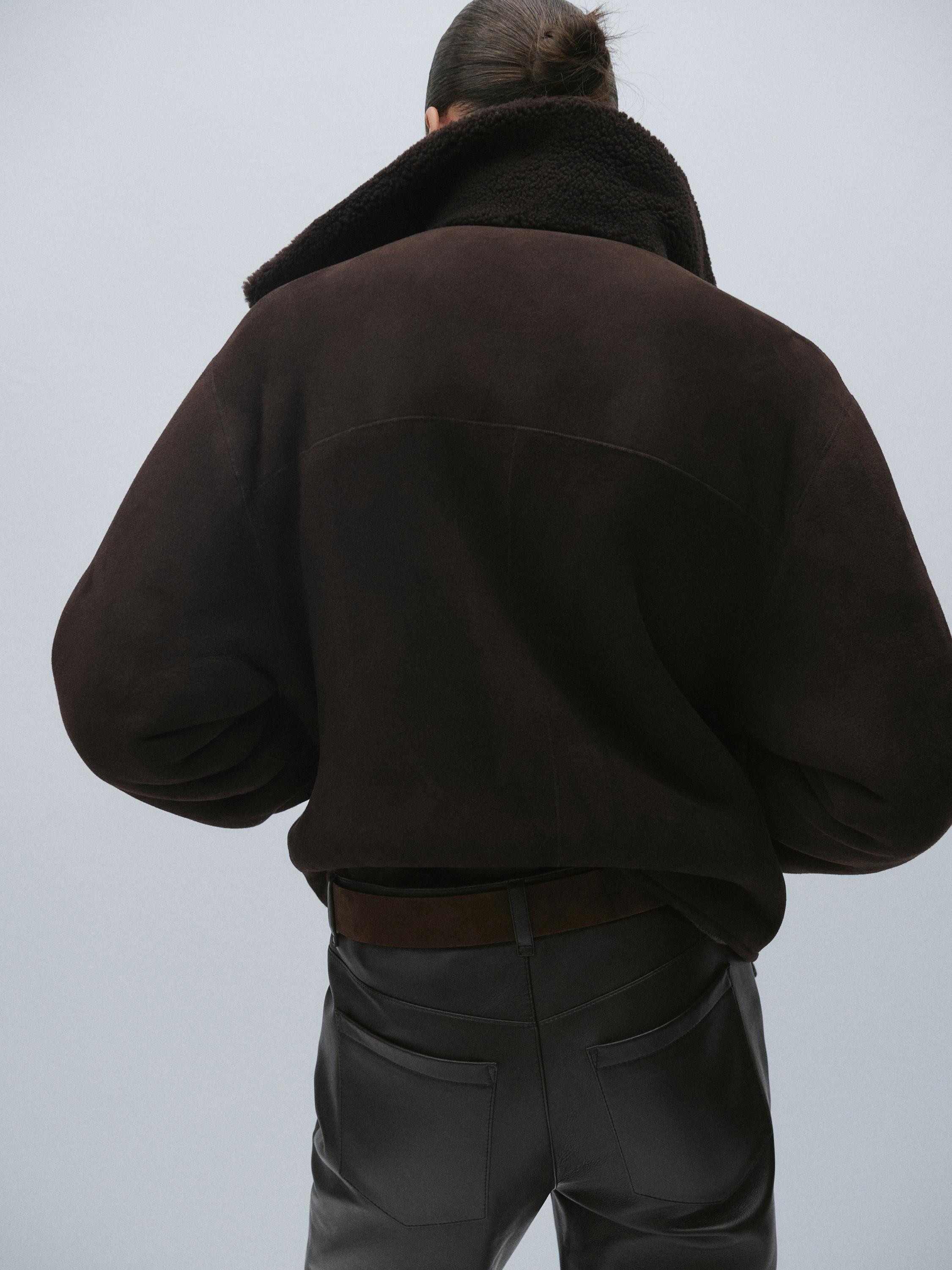 NEW Short shearling coat  £899.00 undefined. Coat made of 100% sheepskin . Button fastening. Two... | Massimo Dutti UK