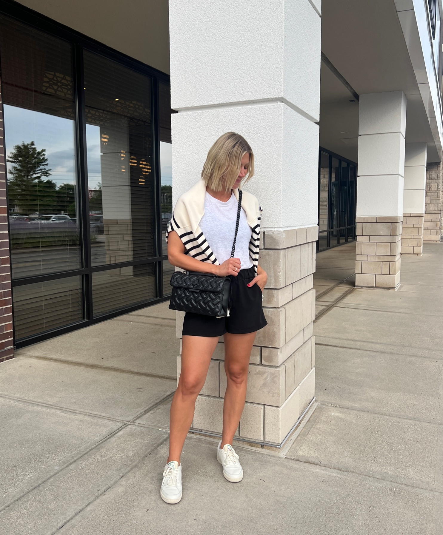 Comfy Chic Outfit Idea
•
black shorts, striped sweater, white tank, sleeveless tank, white sneakers, black purse, quilted handbag, black bralette 

#LTKunder50 #LTKsalealert #LTKstyletip