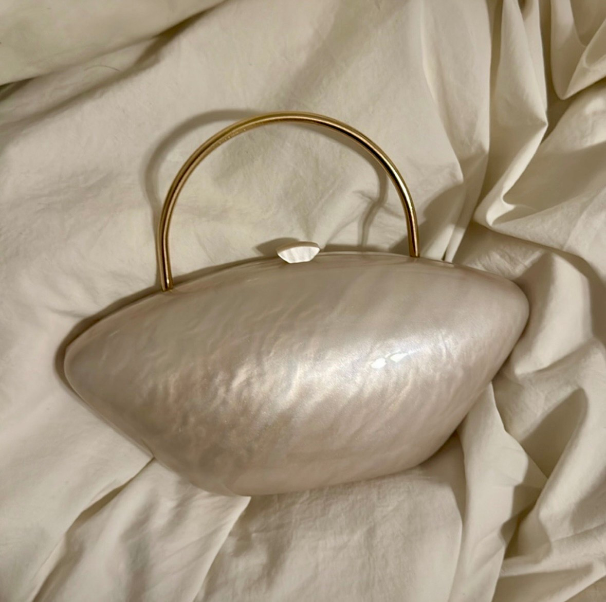 Zara summer clutch bag, prettiest pearly color with gold handle 🤍
Linked an identical dupe plus other Zara clutch bag dupes 

winter 2025 fashion Christmas glam holiday holiday festive party glam New Year’s Eve NYE birthday gala cocktail evening gown formal dress special occasion party night out outfit dinner date night sparkle shiny shimmer metallic gold silver sequin glitter crystal rhinestone embellished pearl beaded clutch heels stilettos sparkly luxe elegant classy old money trendy bachelorette engagement bridesmaid bride bridal family ootd inspo revolve zara express h&m asos house of cb meshki nordstrom mango velvet satin fur wool knit sweater cardigan coat trench peacoat jacket long sleeves leather faux leather tweed corduroy dark denim jeans vest pleated skirt high boots flats loafers suede gray Black Friday burgundy maroon wine emerald green olive brown caramel taupe khaki tan beige camel pleated ruffle flare classic workwear office professional boho country concert transitional pajamas loungewear minimal cozy vibe styling cinched waist blazer peplum lace cape draped casual Atlanta personal stylist Atl influencer viral fall fashion autumn fashion European adidas red samba sneakers easy mom outfits affordable fashion bucket bag new in comfy clothes top flats jewelry earrings bracelet necklace purse christmas december party wedding guest pink target sale midsize active gym alo designer dupe home decor bow timeless street style layering luxury budget high end statement accessories runway inspired neutral oversized modern vintage must-have shopping haul new arrivals style tip Pinterest matching 2 piece set tiktok vacation monochrome monochromatic travel essentials capsule wardrobe anthropologie free people abercrombie aritzia cos & other stories amazon fashion finds gap madewell reformation cult gaia skims ugg lululemon alo yoga dior chanel prada gucci balmain balenciaga fendi saint laurent ysl jacquemus odd muse handbag thanksgiving


#LTKSpringSale 

#LTKStyleTip #LTKFindsUnder100