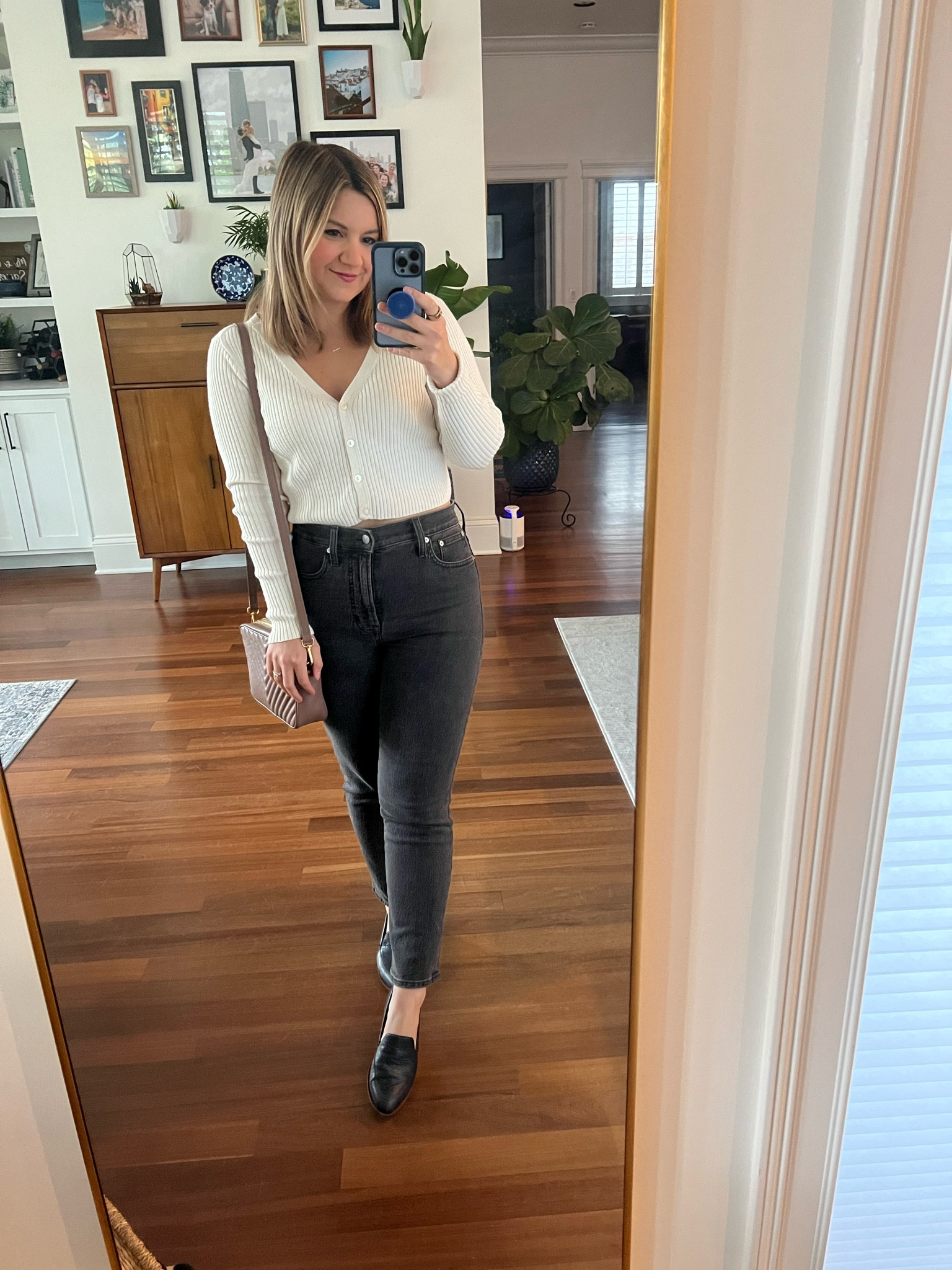 Sweater is old but the jeans are still available! I am more of a 27 now but I got these in a petite 26! 