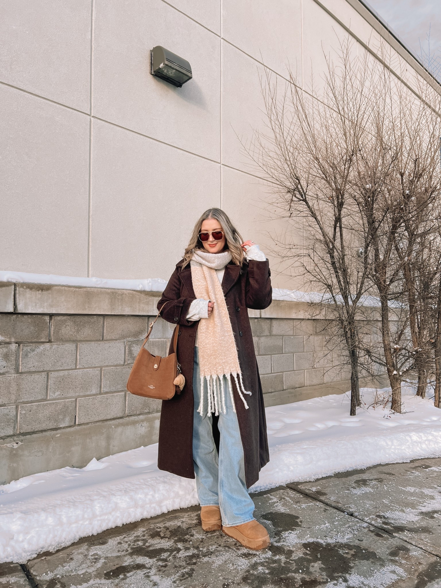 Casual winter outfit! I’m wearing my usual size L in my Abercrombie long chocolate brown wool blend coat. These are my all time fave jeans from Abercrombie, wearing 32 for a looser fit. My Ugg style platform boots are Amazon and such good quality, I’m a 9.5-10 and wear a 10. I’ve been using this suede Coach shoulder bag on repeat and it’s perfect for everyday. Linked similar scarf & sweatshirt 


#LTKmidsize #LTKwinter #LTKsale