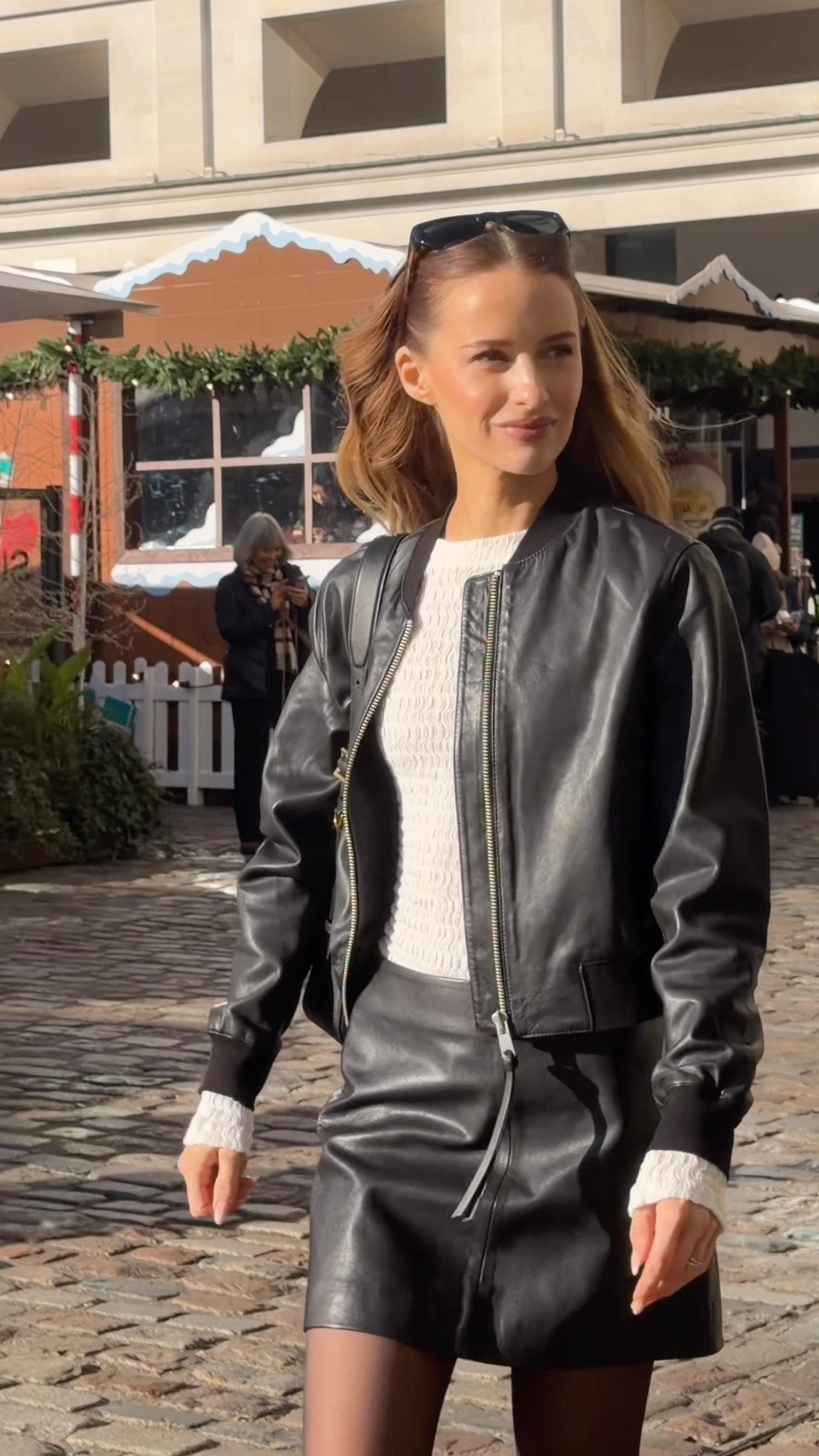 Matching leather bomber jacket and mini skirt 🤍