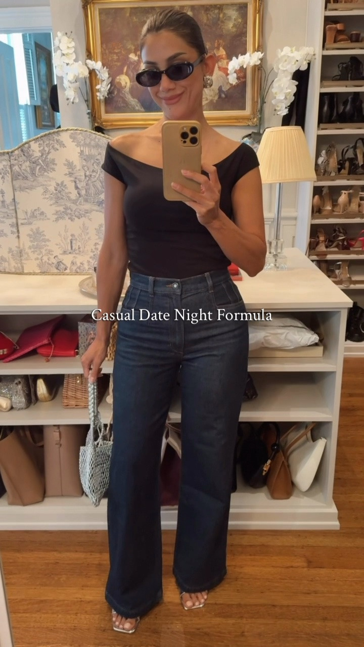 If you’re staring at your closet wondering what to wear tonight, steal this formula:

High-waisted wide-leg jeans + fitted off-the-shoulder top + sleek low chignon + vintage statement earrings.

That’s it.

The wide-leg jeans keep it comfortable and flattering, while the bare shoulder modestly shows some skin for date night. But this is the *extremely* simple, elegant, elevated styling trick that makes this date night look special: slick your hair into a low chignon and add a fabulous pair of vintage earrings. I swear that’s all it takes to make it feel almost editorial. You’re not unimaginative and basic. You are the epitome of fashionable restraint and it comes through as alluring without trying. 

Mine are vintage silver and pearl. And yes, I’m a Warm Autumn who generally avoids silver. But black + silver? Elite. Sleek, modern, and elegant enough that I’m willing to break my own color rules occasionally.

I added silver wedges and a mesh bag for a little understated shine.

The best part? You can repeat this formula endlessly. Different jeans. Different fitted top. Different fabulous earrings. Same low chignon. Same effect.

Comfortable. Flattering. Feminine. Easy.

Save this one for your next casual date night.

Wearing: @anntaylor top | @favorite.daughter jeans (a Depop score!) | @jcrew bag | Jason Wu sunglasses via TJ Maxx | vintage earrings

#LTKootd #LTKOver40