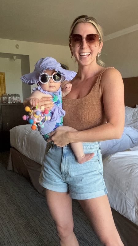 My fave rolled denim shorts are restocked!! They run true to size. My swimsuit and the baby swimsuit are linked. Sunglasses are An Amazon find 

#LTKFindsUnder100 #LTKBaby #LTKStyleTip