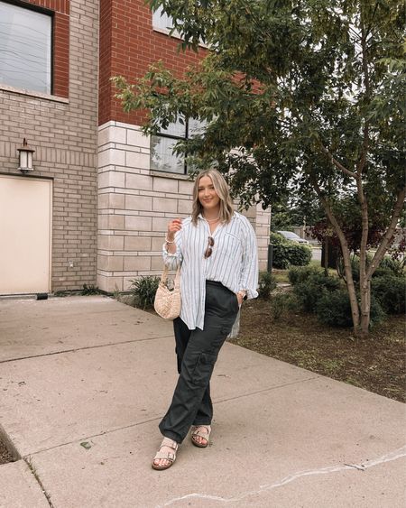 Midsize summer outfit - blue striped linen button up shirt & cargo pants. Wearing my usual size large in both

Linked similar straw handbags 

#LTKcanada #LTKsummer #LTKmidsize