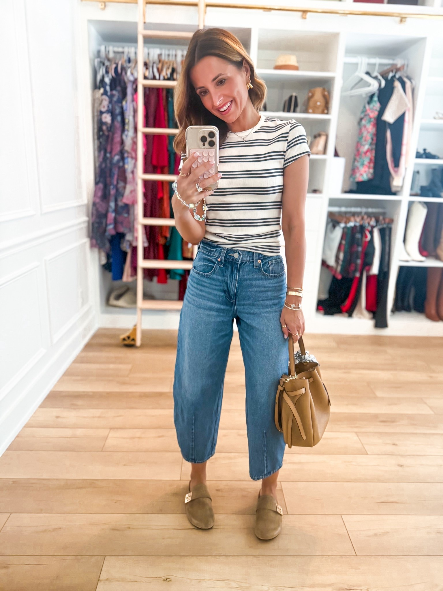 My Target outfit of the day! Barrel leg jeans in 00 short. Striped crewneck tee in XS. Tory Burch mules are TTS. Tory Burch romy bucket bag. Spring outfit. Casual outfit. Mom outfit. 

#LTKootd #LTKPetite #LTKgrwm