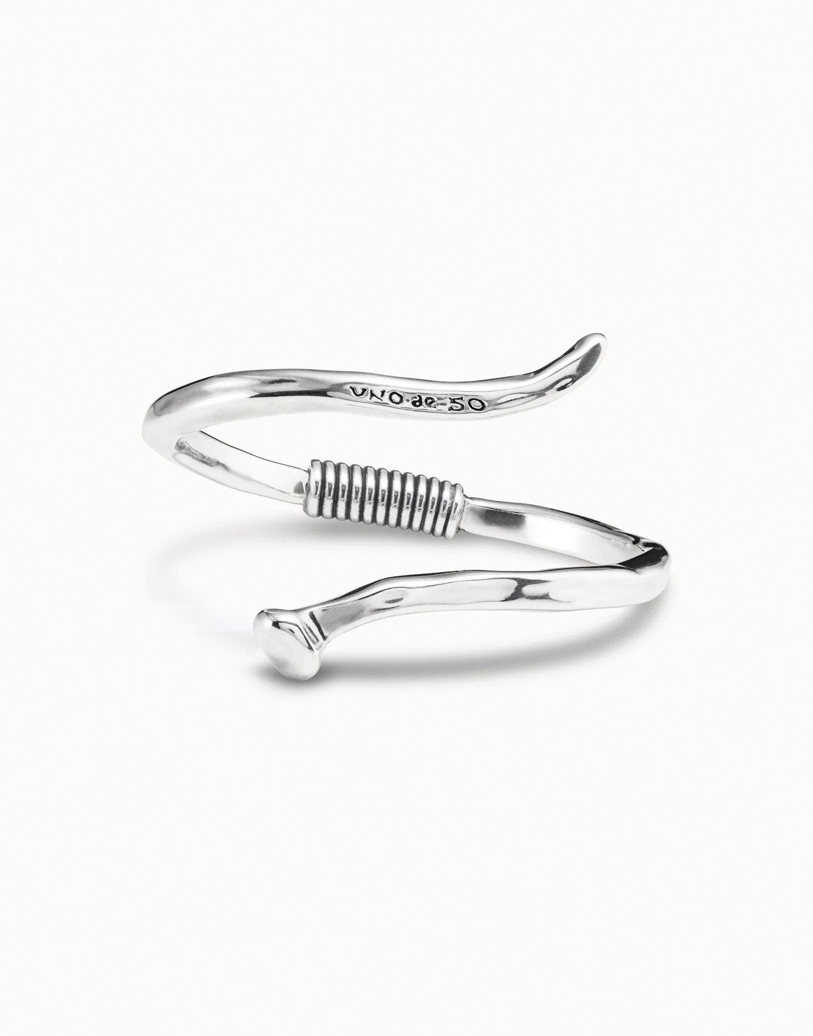 Bangle bracelet with a spiral-shaped nail | UNOde50