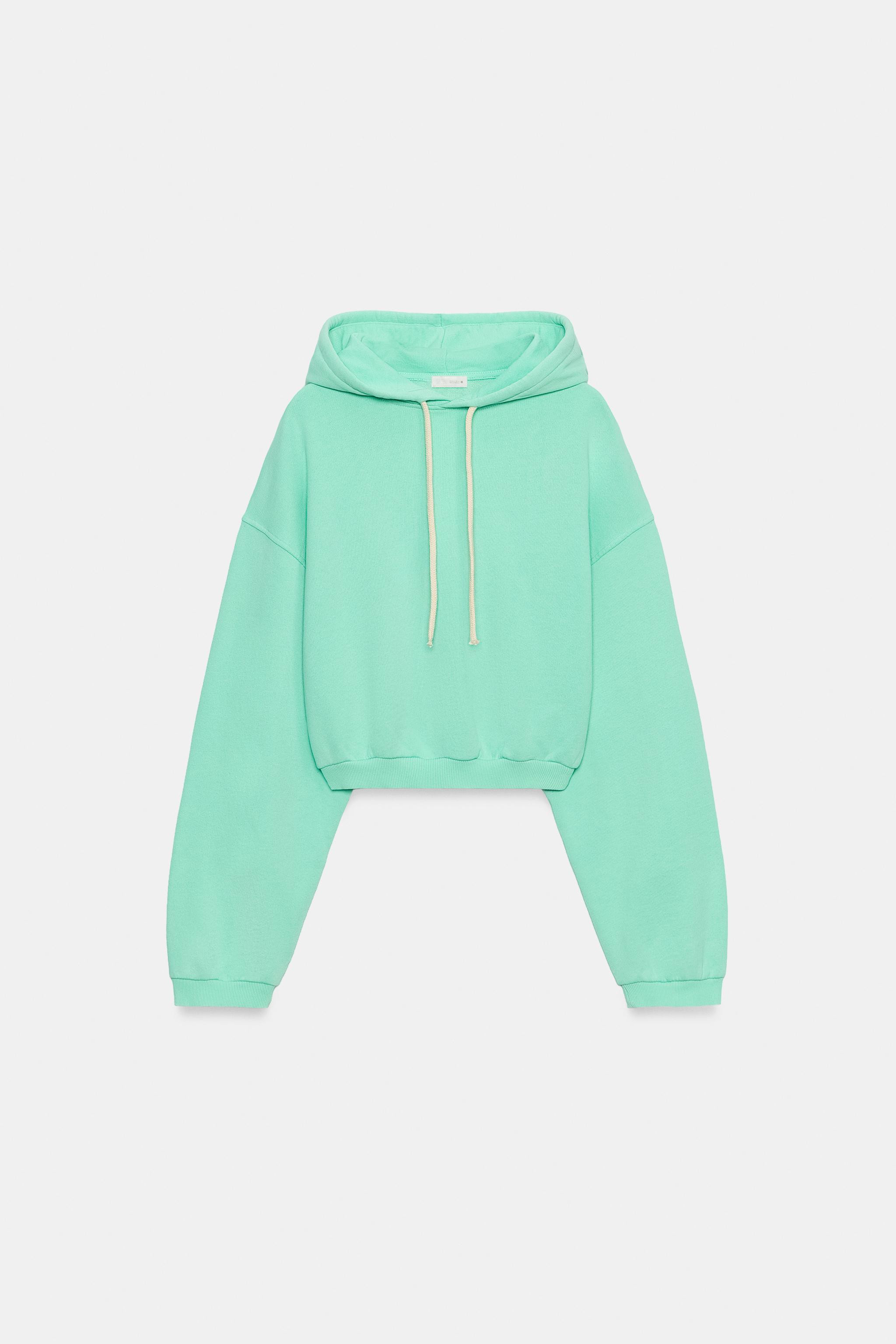 Sweatshirt crafted from a cotton blend fabric. Round neck and adjustable hoodie with buttons. Fea... | Zara UK