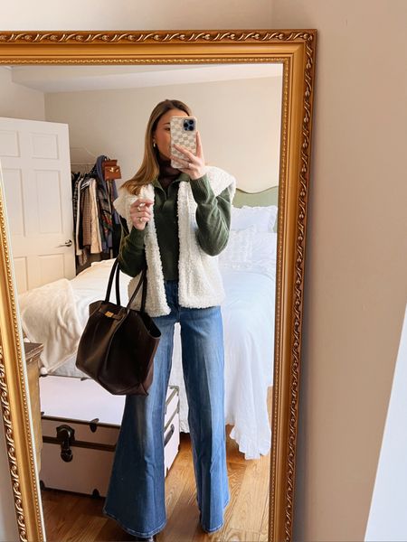 Annie b. / ootd / green and brown / Demellier / frame denim / flared jeans / flared denim / croc embossed boots / winter layering outfit / winter outfit / Sherpa vest / Sherpa look / green cashmere 
I am an employee for Tuckernuck. All thoughts and opinions expressed herein are my own and not influenced by Tuckernuck in any way.  The link provided is an affiliate link, which means that I can earn commission if you choose to click through it and purchase an item. 

#LTKworkwear #LTKGiftGuide #LTKstyletip