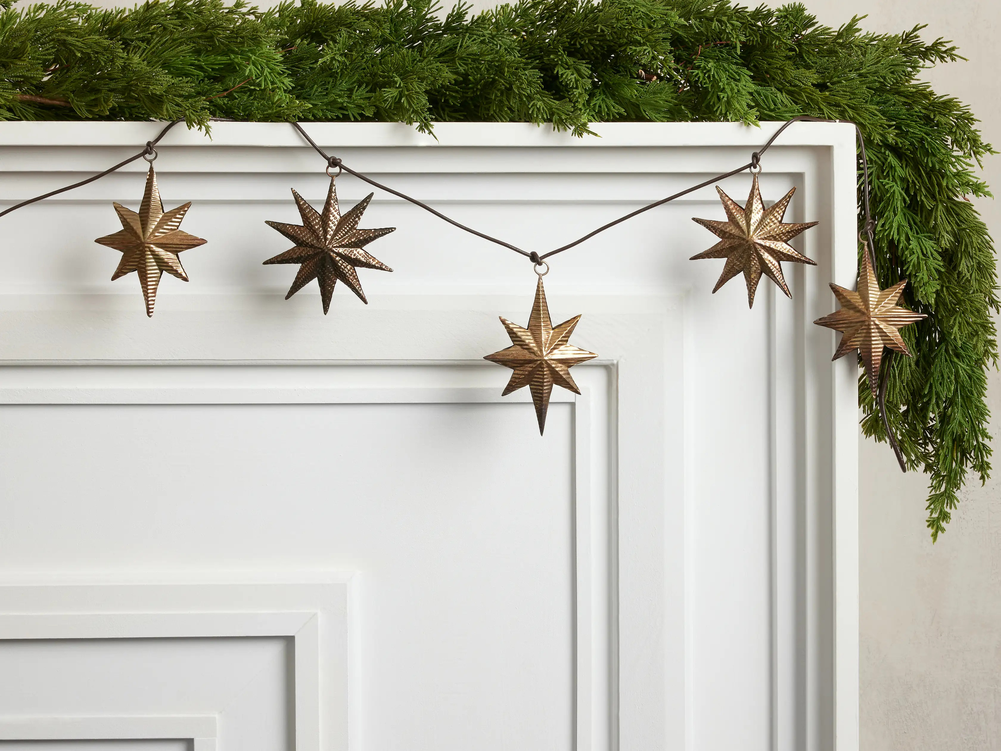 Embossed Star Garland In Brass | Arhaus