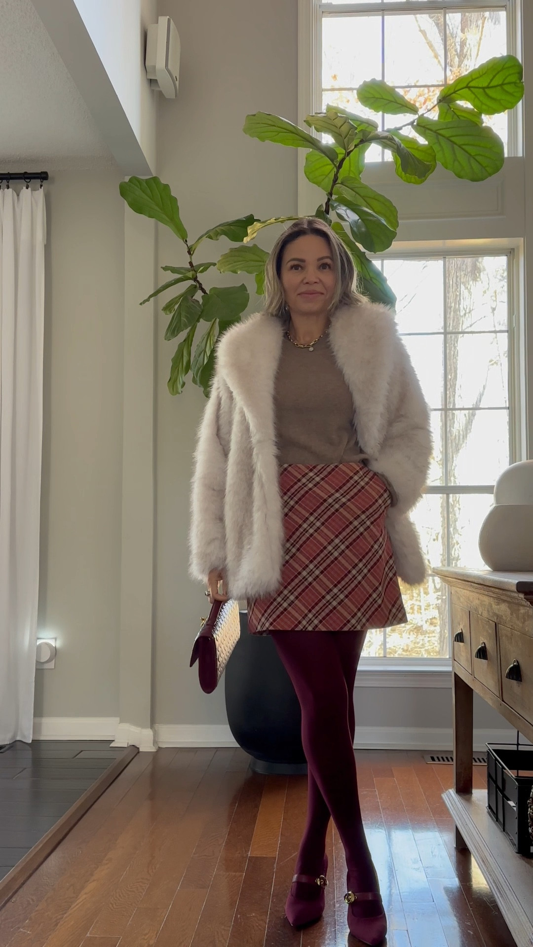 Winter outfit
Camel cashmere sweater paired with burgundy stockings, plaid mini skirt, Maryjane heels, faux fur coat and burgundy clutch 

#LTKGiftGuide #LTKHoliday #LTKgrwm