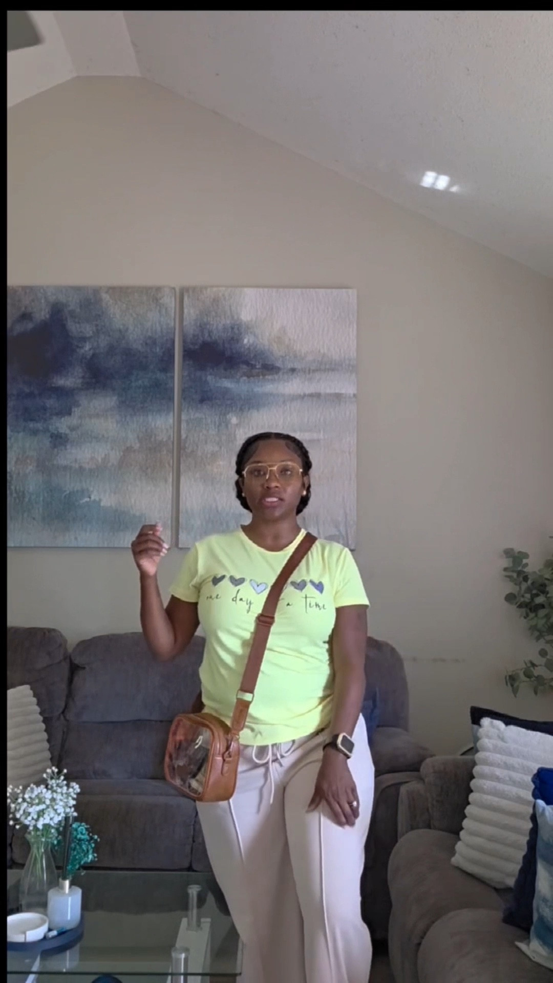 Busy errand days still deserve a cute look 🤍  

I’m wearing a tan pair of joggers that are perfect for all day comfort, paired with a yellow graphic tee for an easy pop of color. Kept it simple with light brown tinted shades, brown slides, and a clear bag that gives just enough style while still being practical for the day.  

I kept the jewelry minimal with just my wedding band and Apple Watch because today is all about comfort, movement, and getting things done.  

Easy, comfortable, and still put together exactly how we like it ✨

#LTKootd #LTKActive #LTKmomlife