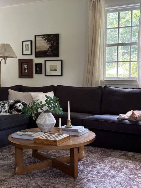 My transitional cottage living room featuring an IKEA Kivik sectional with a dark gray cover, gallery wall, Joanna Gaines x Loloi Sinclair rug, Amazon curtains, Target vase and thrifted decor 

#LTKhome