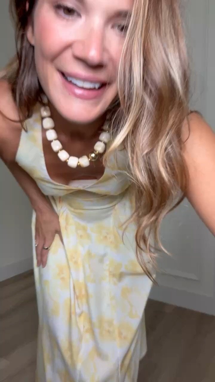This dress is so pretty for end of summer events. The halter neckline and defined waist give it such a flattering shape, while the fuller midi skirt has the prettiest movement. The soft yellow floral print makes it an easy wedding guest or shower option.

summer dress, floral midi dress, halter dress, wedding guest dress, shower dress, feminine style, summer event outfit, midi dress, date night dress, stangandco

#LTKootd #LTKSeasonal #LTKTall