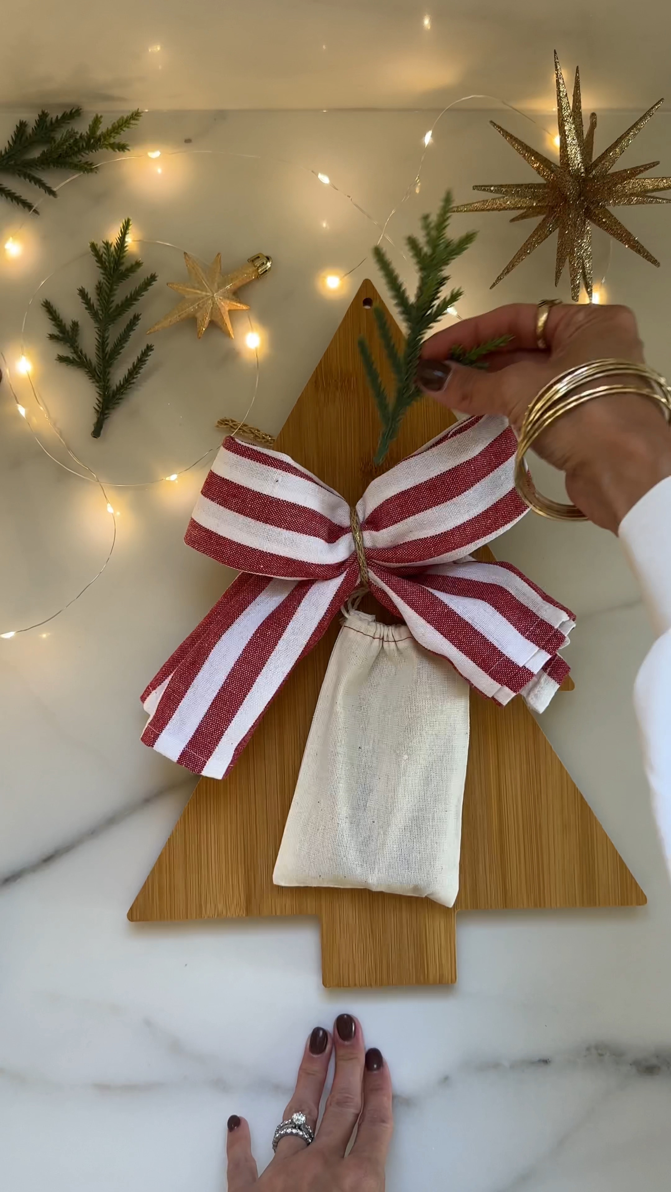 This Christmas tree charcuterie board paired with cheese knife set and a dish towel tied into the cutest bow is sure to impress! Perfect for any foodie or hostess on your list.  Everything I used is from Amazon! #HolidayGiftIdeas

#LTKHoliday #LTKWatchNow #LTKGiftGuide