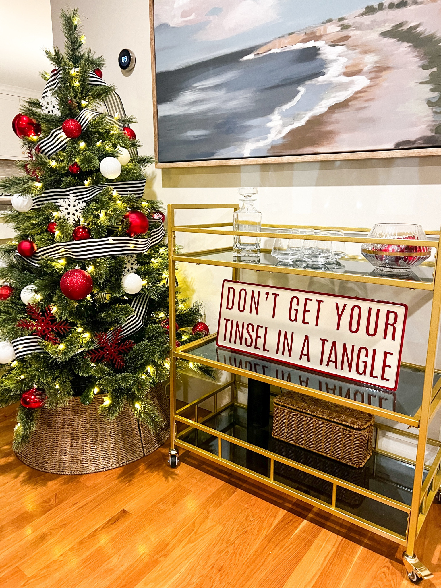 A bar cart is a nice touch for smaller spaces and especially for holiday hosting. This bar cart is an affordable and simple, elegant style. It fits nicely in corners and has wheels to move when needed.

#LTKHoliday #LTKHome
