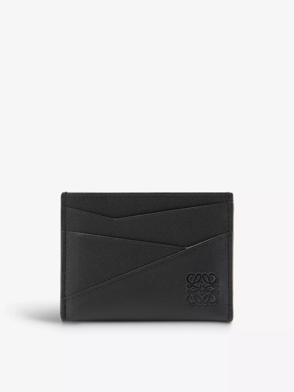Puzzle Edge brand-debossed leather card holder | Selfridges