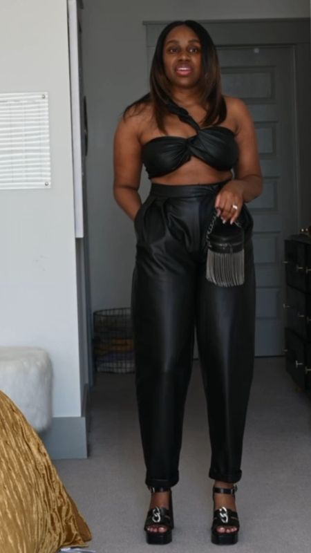 I’ll be traveling to Houston, TX soon and this faux leather look is a great date night outfit idea! You can never go wrong with a black look. I also love the fun touch that this bag brings to the outfit. 

#LTKVideo #LTKSeasonal #LTKstyletip
