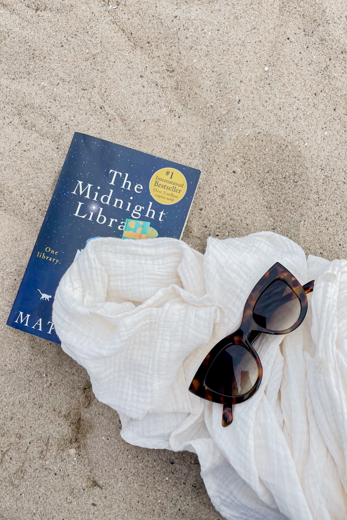 A good beach read (and other beach essentials) 

#LTKSwim #LTKOver40 #LTKSummerSales