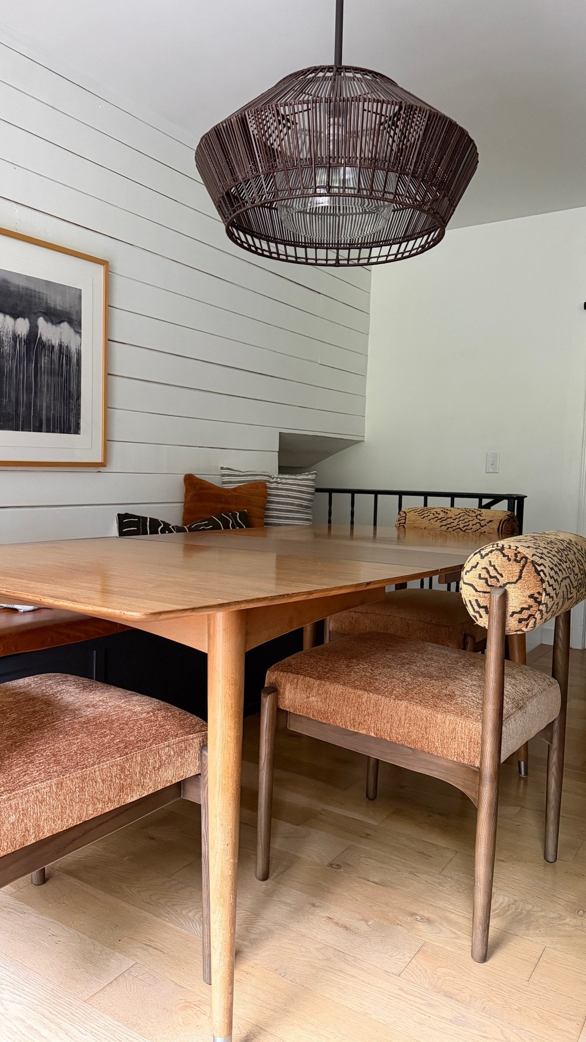 Warm and comfortable dining chairs. They are almost like a light walnut in color.