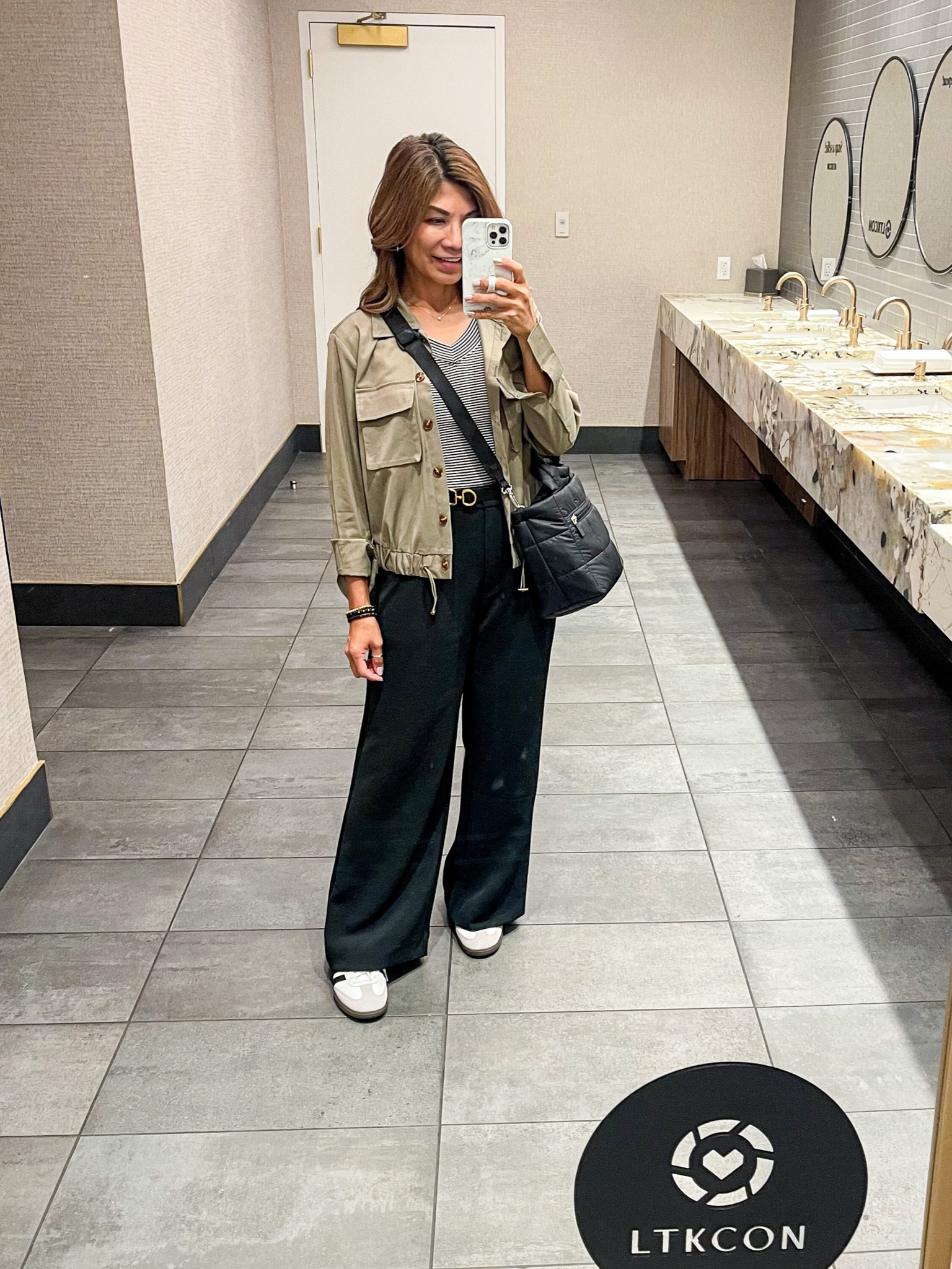 Travel outfit to LTK Con.
Jacket in XS. 
Striped tee I sized up to medium.
Trousers fit tts short length.
Adidas Samba fit tts. Linking similar as well. #LTKCon 

#LTKtravel #LTKstyletip