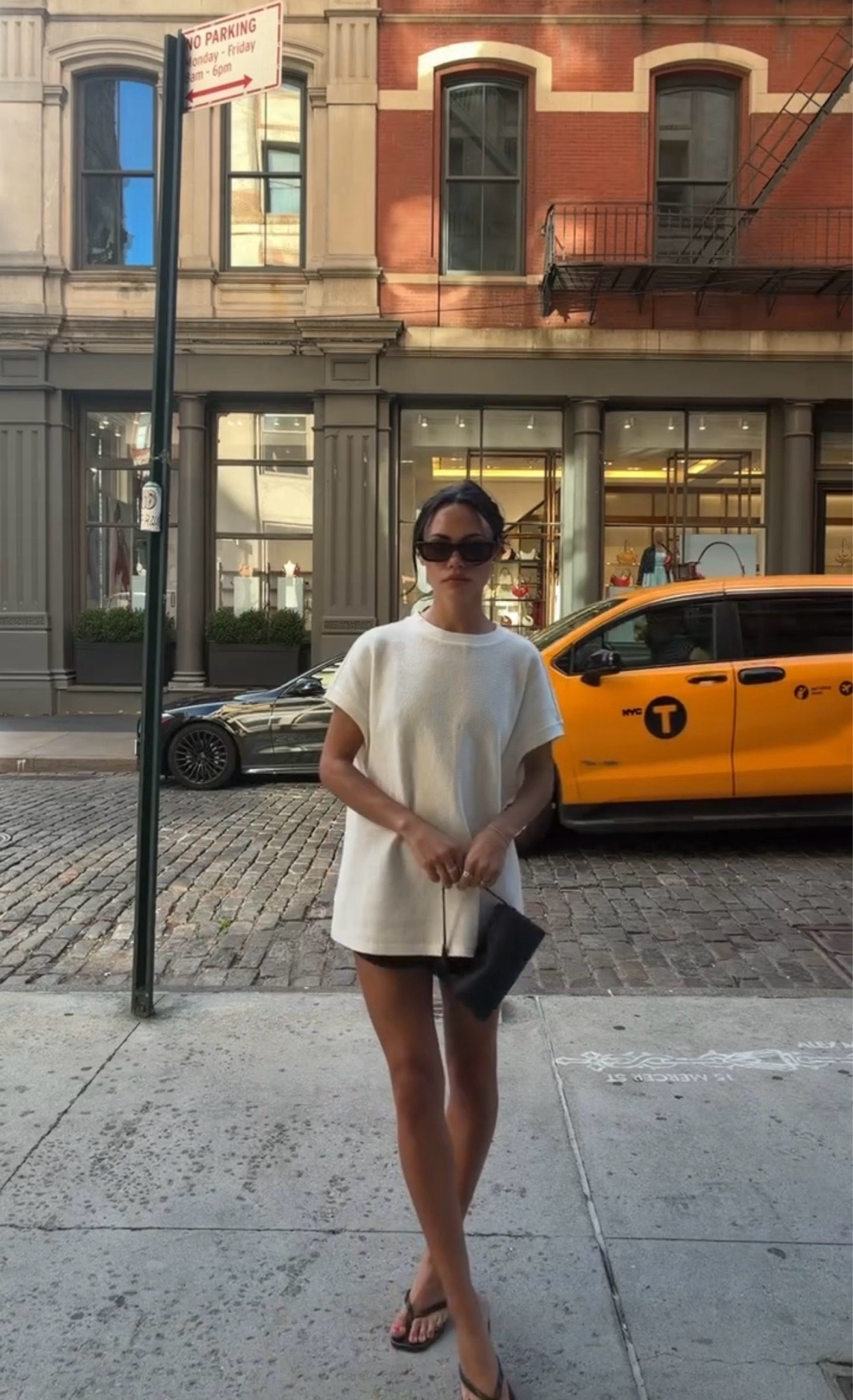 VRG girl oversized tee, revolve black mini shorts, Marc fisher heels & Danielle guizio black bag

#LTKdayinmylife #LTKgrwm #LTKootd